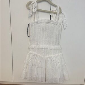 Katie J NYC White smocked ruffle
Dress nwt